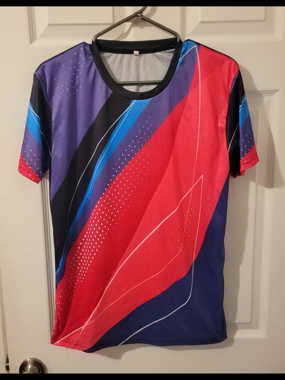 Women’s Short Sleeve Performance Tee in Red & Blue.
